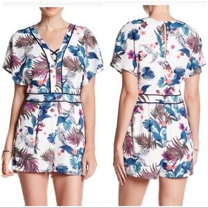 Adelyn Rae Leaf Print Cage Summer Romper with Pockets